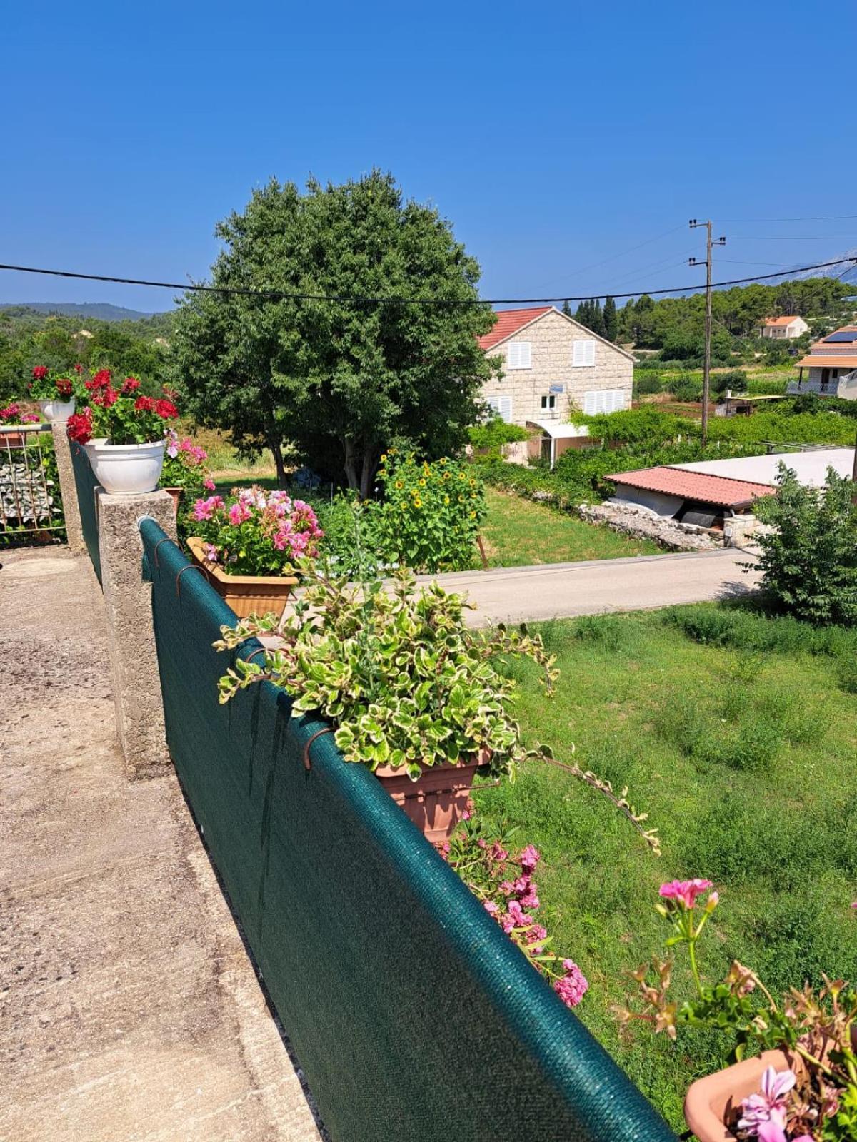 Apartmani Dusica Lumbarda Buitenkant foto