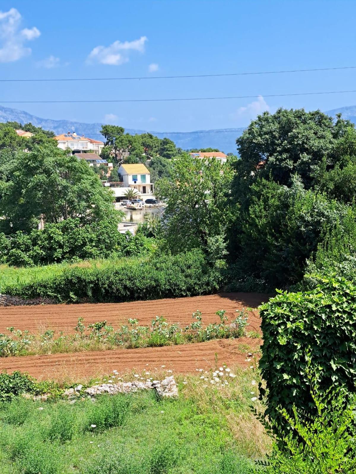 Apartmani Dusica Lumbarda Buitenkant foto