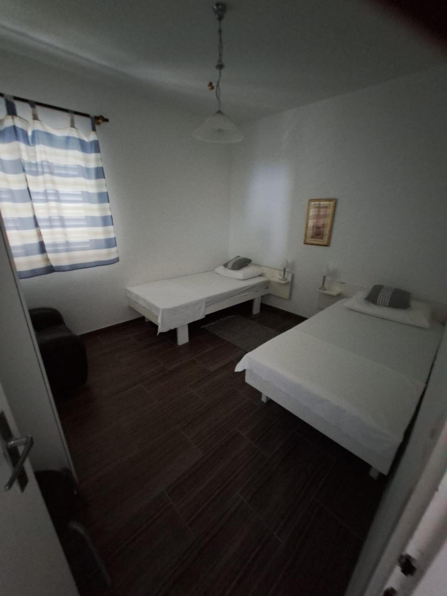 Apartmani Dusica Lumbarda Buitenkant foto